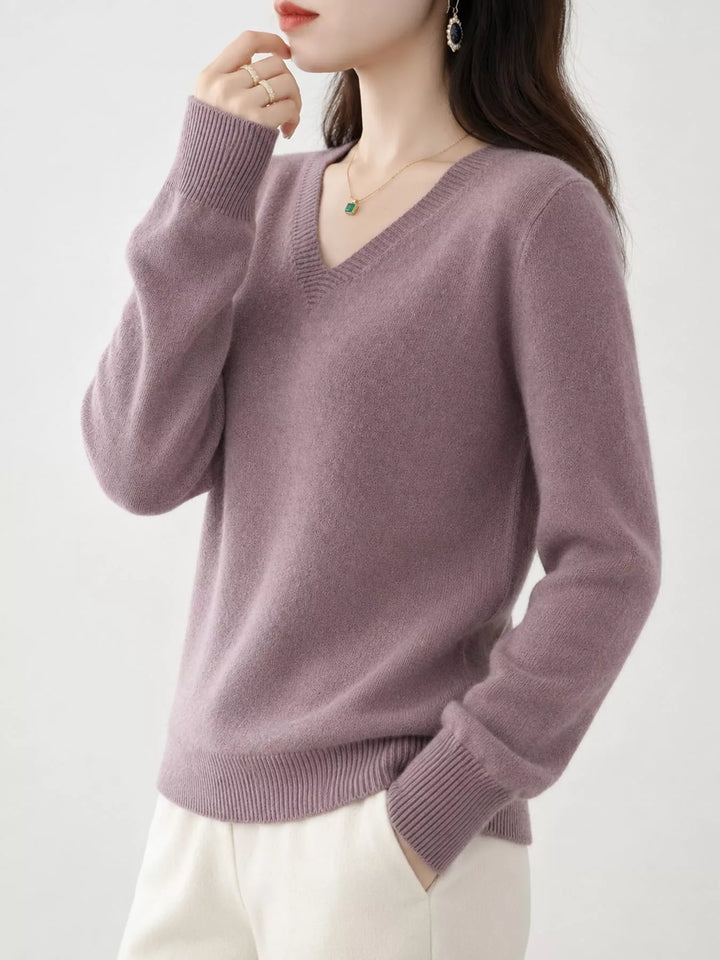 Light Purple V neck sweater worn on-model, side angle with a relaxed fit