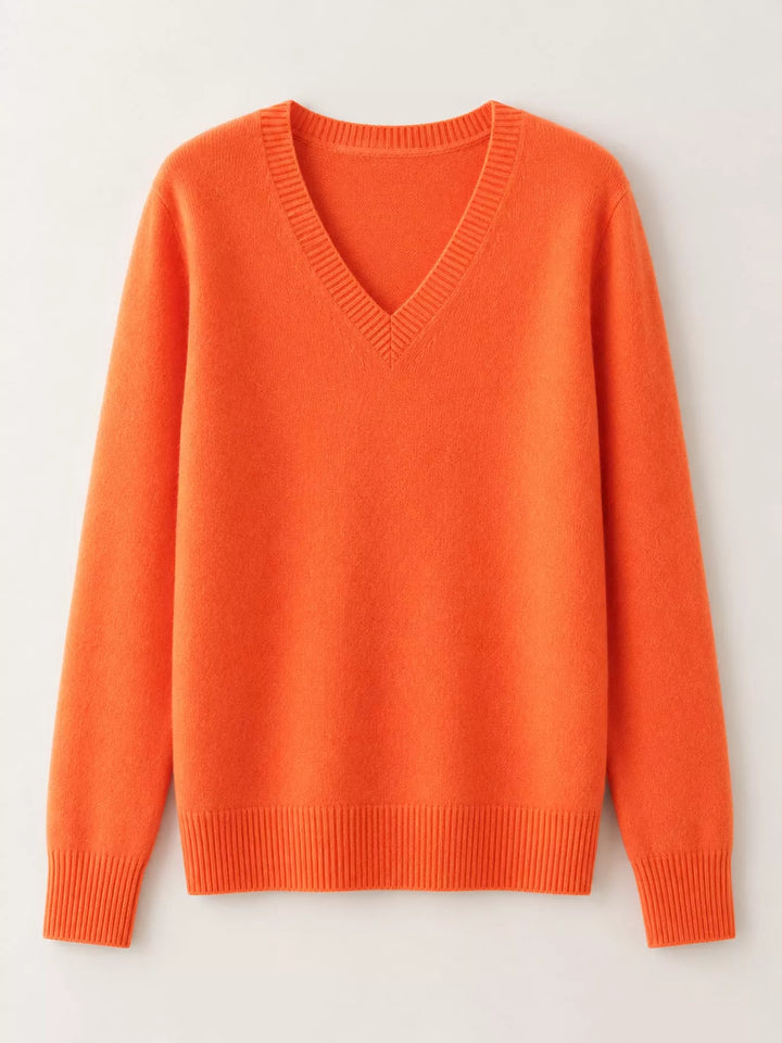 Flat front view of the vibrant orange fine knit long sleeve V neck sweater