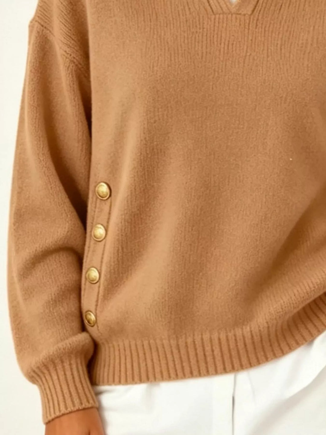 Polo collar gold-tone side buttons in orange-red, close-up detail 2