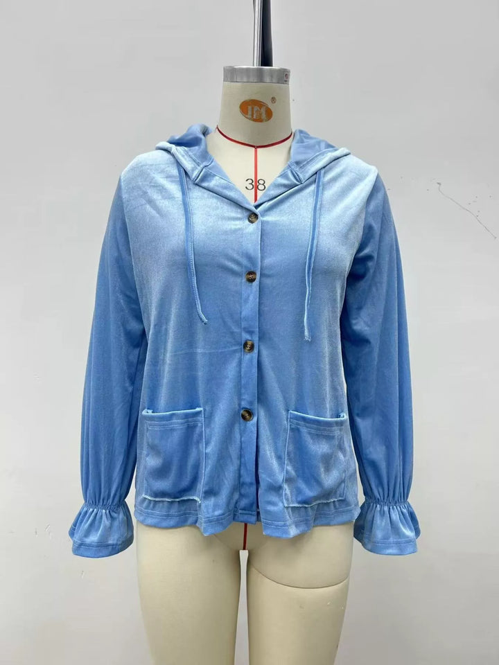 Front view of the sky blue hooded velvet jacket with two pockets and drawstrings