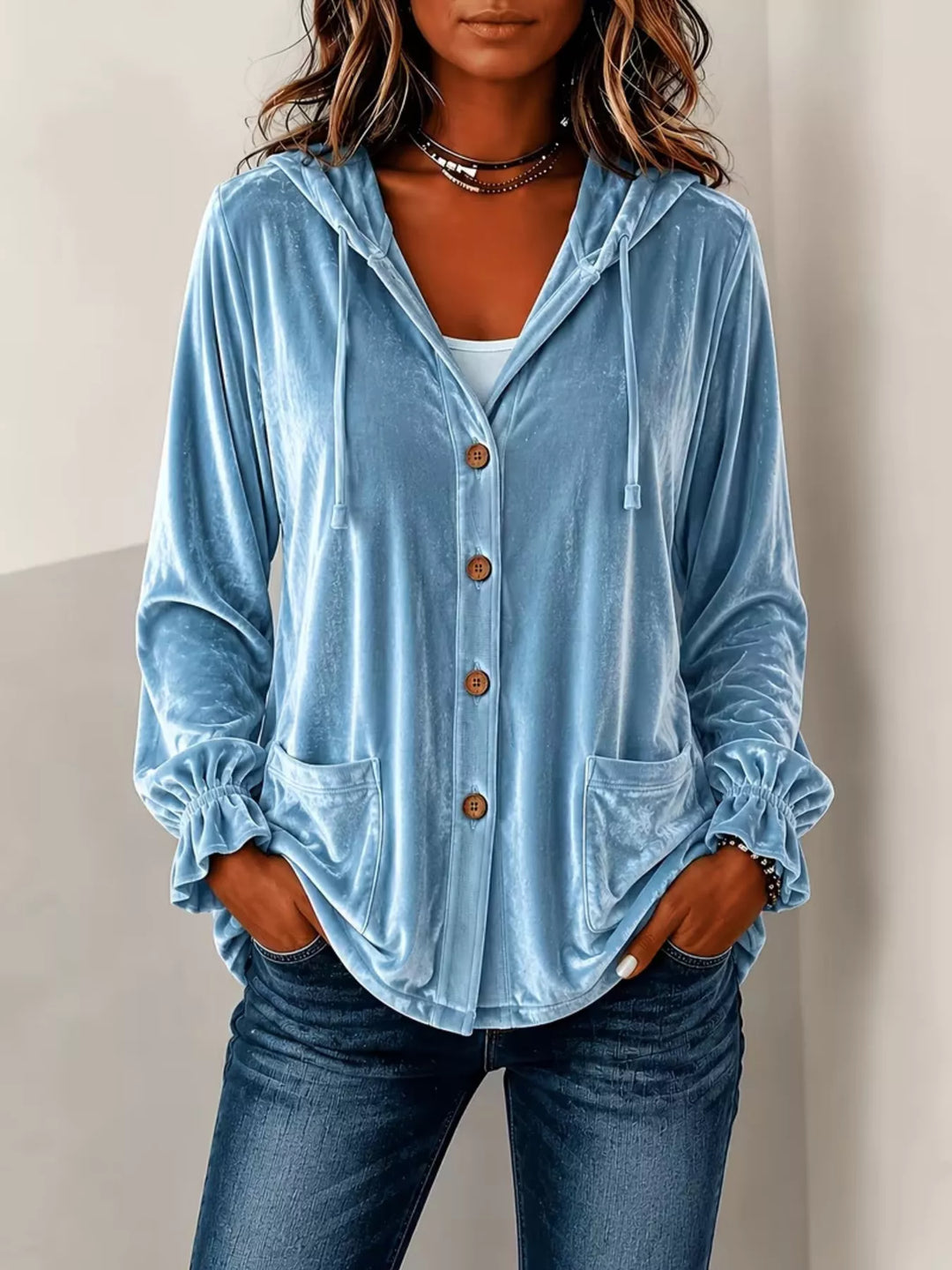Sky blue velvet jacket with hood, styled with a white tee and jeans