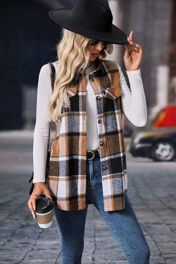 Camel plaid vest styled with a black fedora and flap pockets