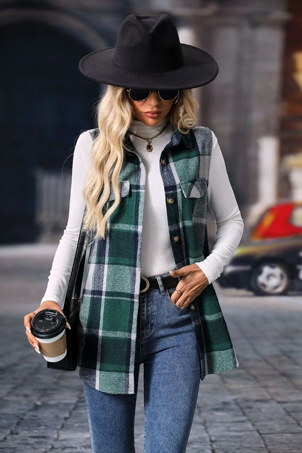 Dark green sleeveless plaid vest with a black hat, three quarter view