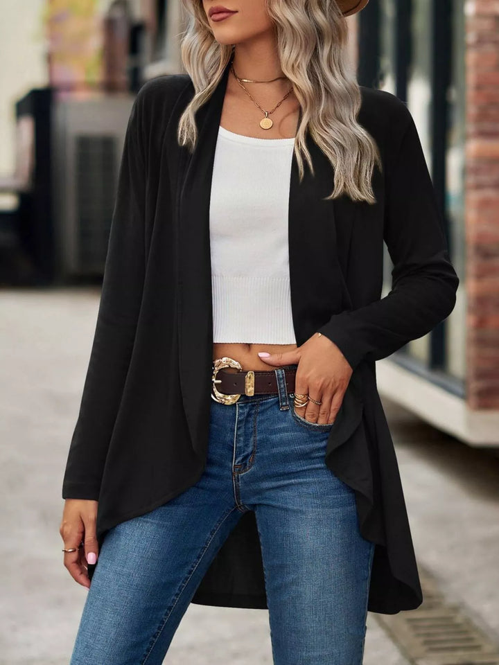 Black open front long cardigan, front view with belted jeans