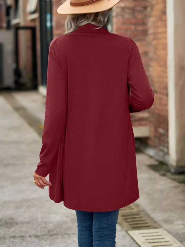 Back view of the burgundy long cardigan with curved hem