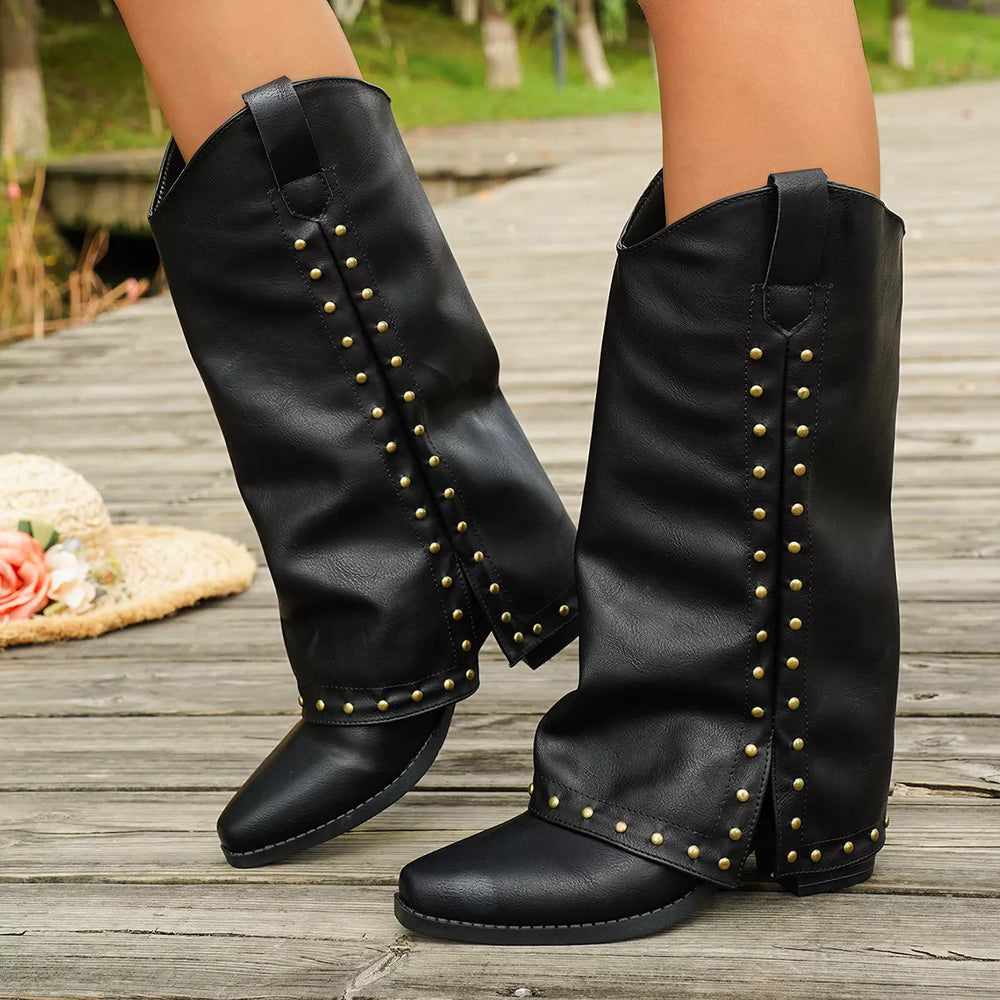 Black mid calf western boots with studded fold over shaft, side view