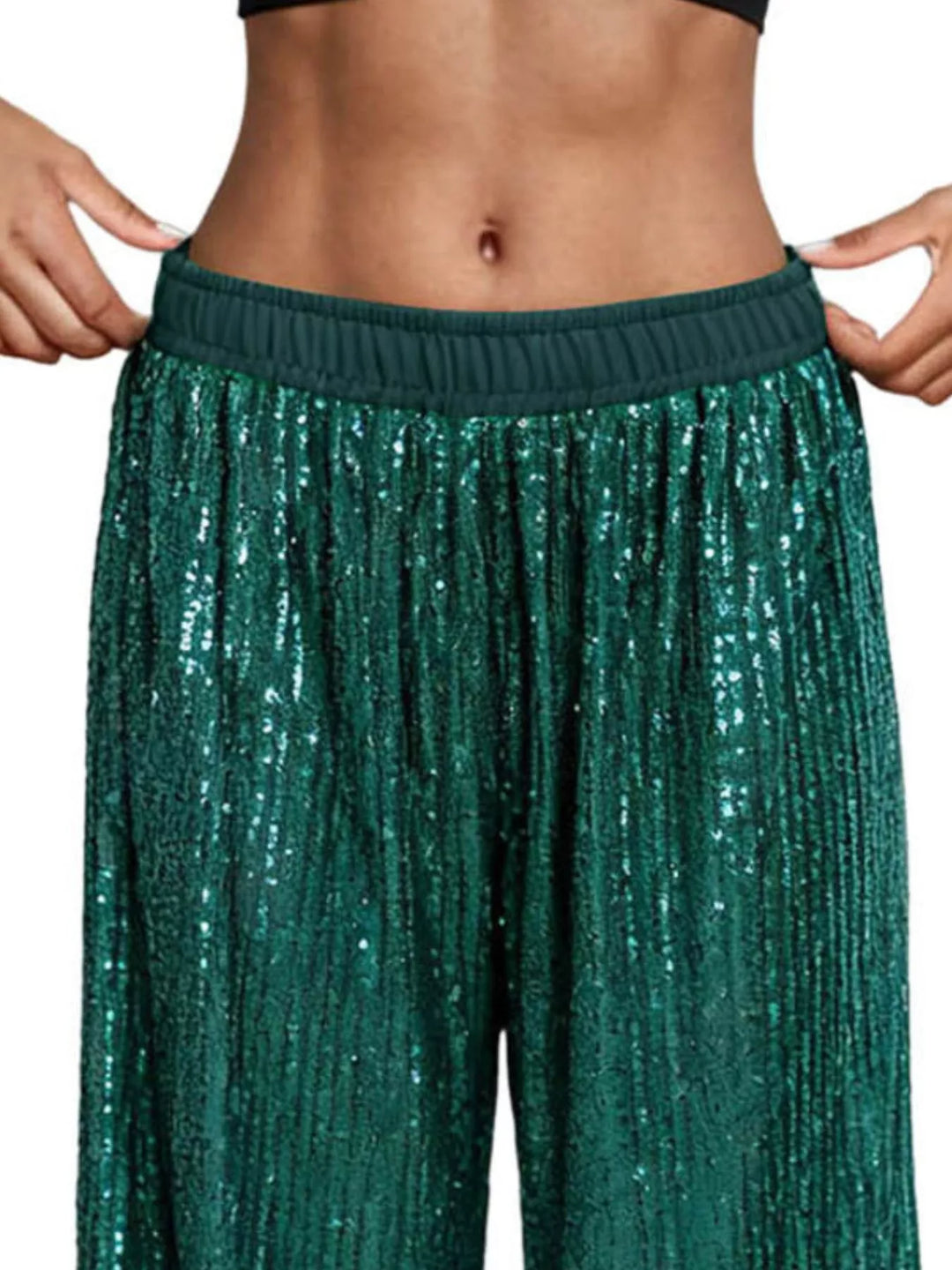 Close-up of the emerald sequin waistband and sparkling fabric