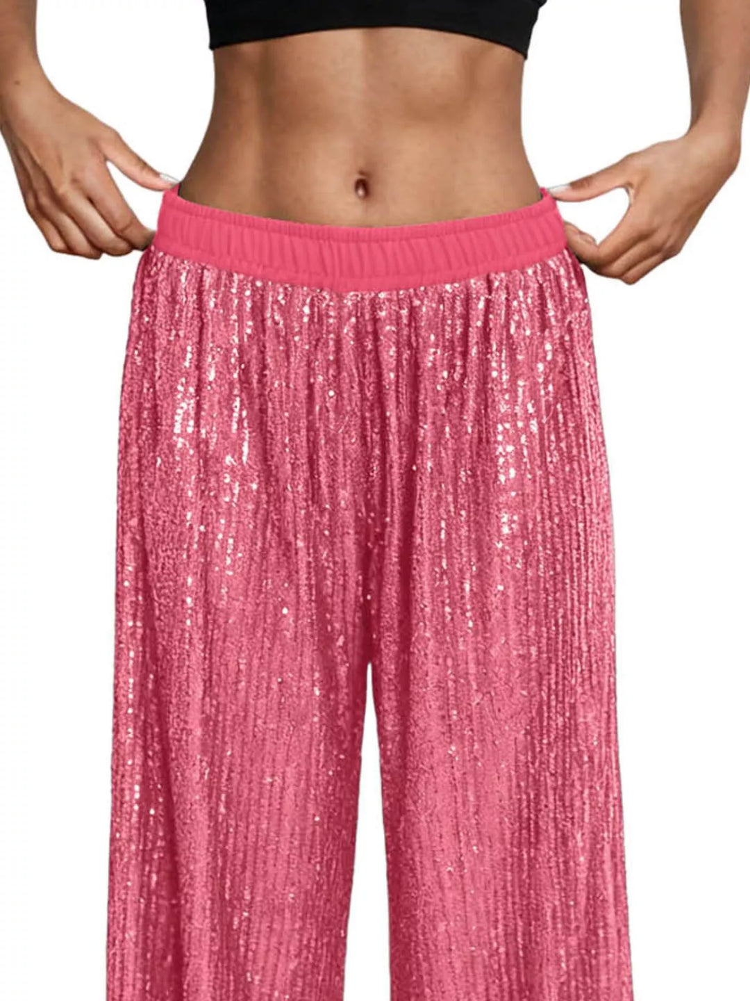 Close-up of the hot pink sequin waistband with coral elastic