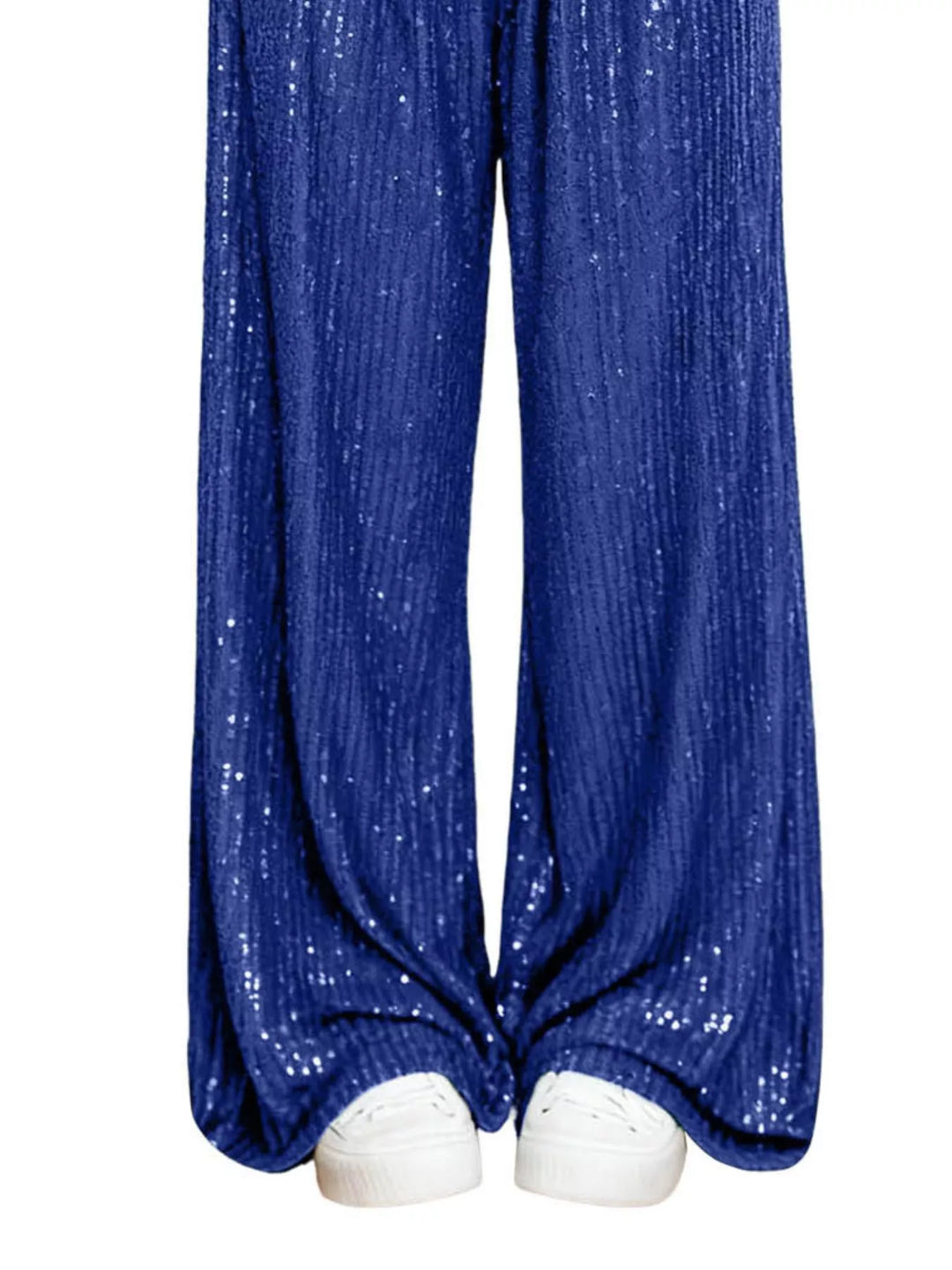 Royal blue sequin wide leg pants hem and white sneakers