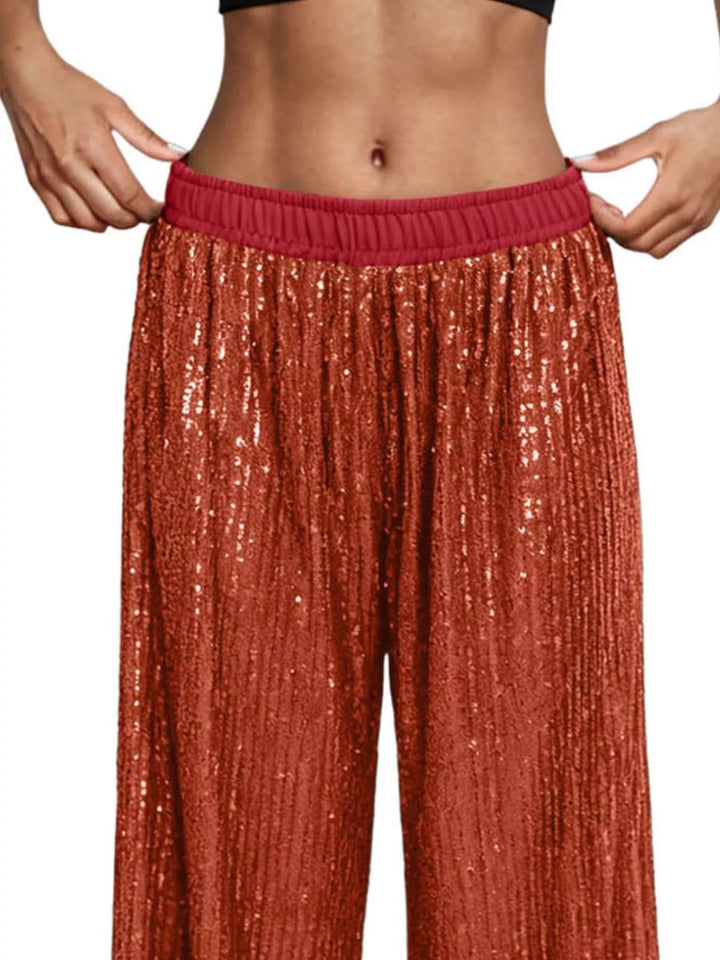 Close-up of the rust sequin waistband with red elastic