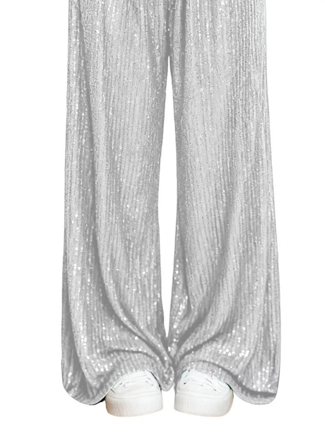 Silver sequin wide leg pants hem over white sneakers