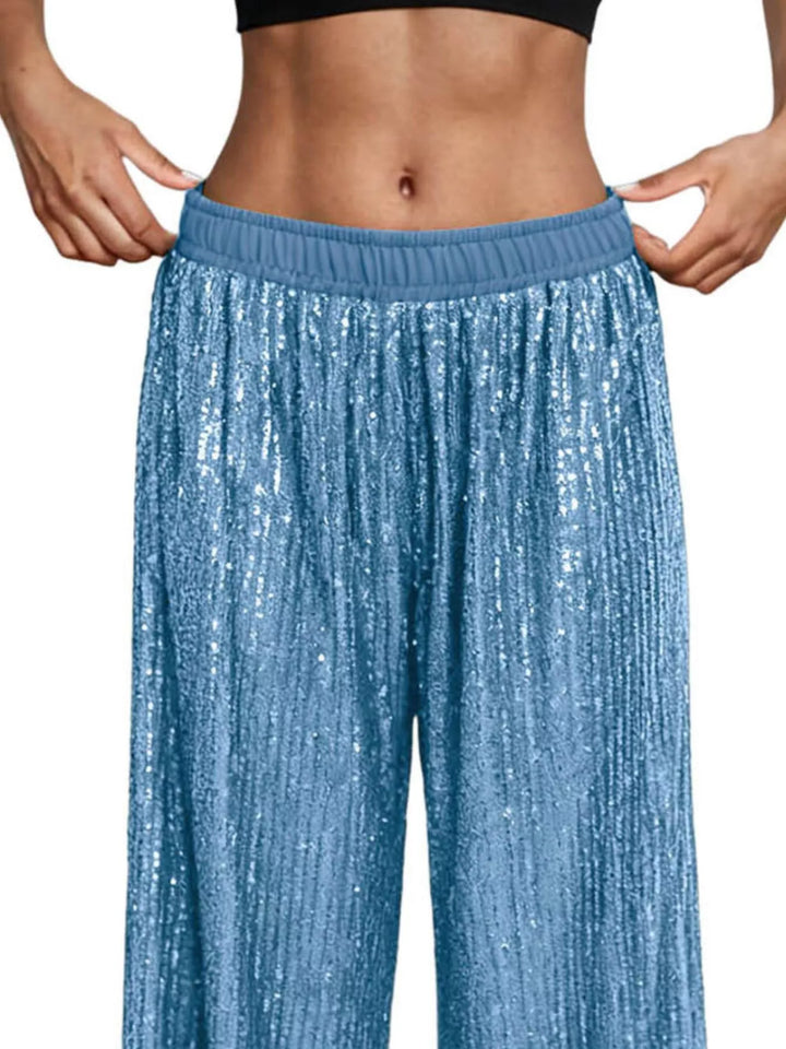Close-up of the sky blue sequin waistband and fabric