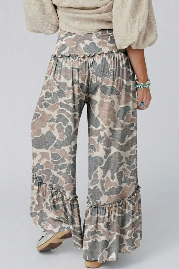 Back view of camo wide leg pants with ruffled hem and sandals