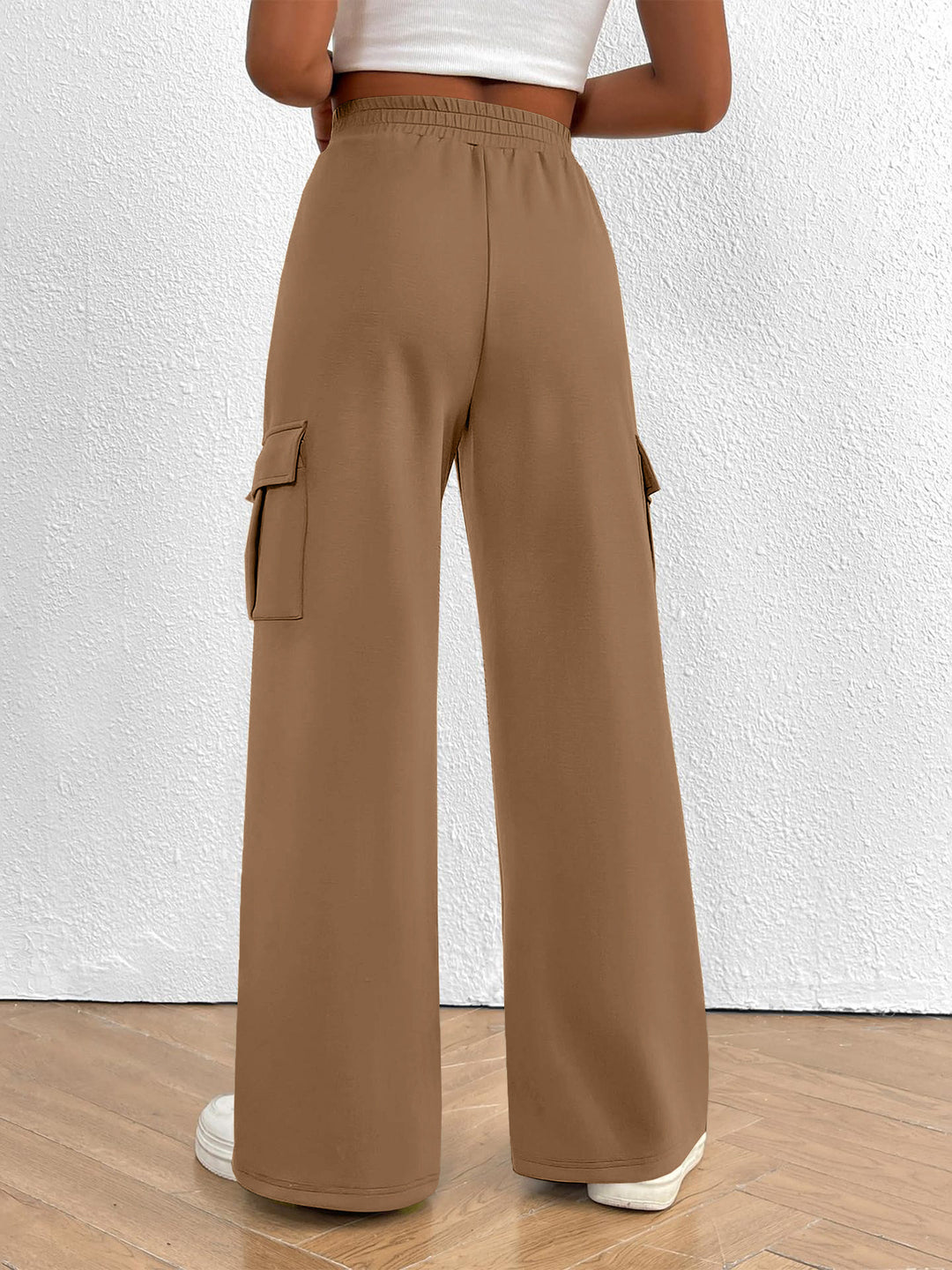 Back view of the women's mocha high waisted wide leg cargo pants