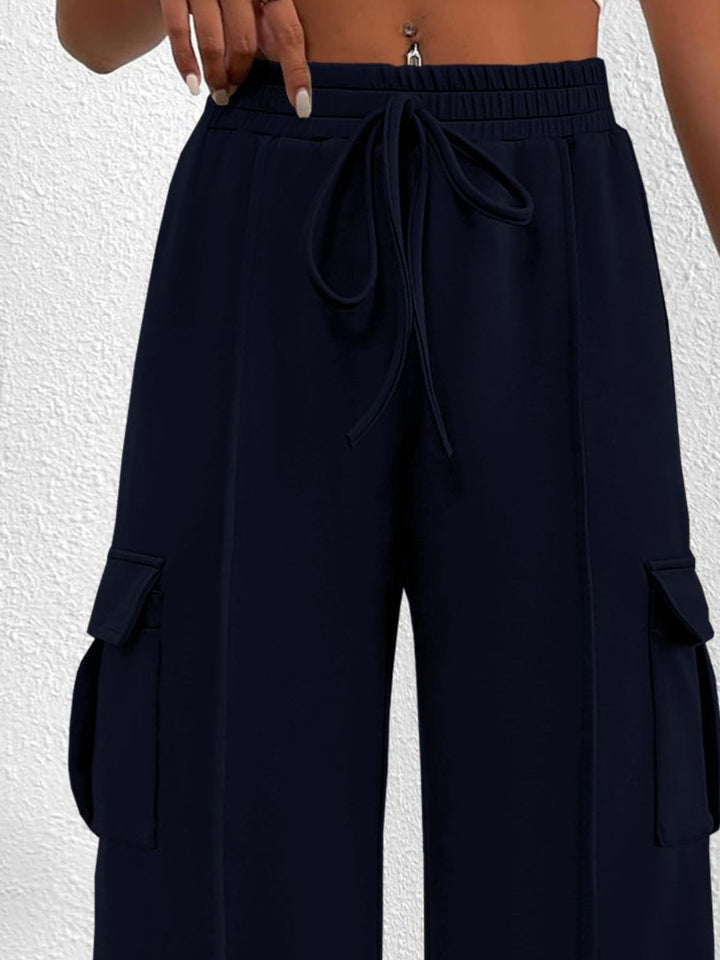 Back view of the women's navy high waisted wide leg cargo pants