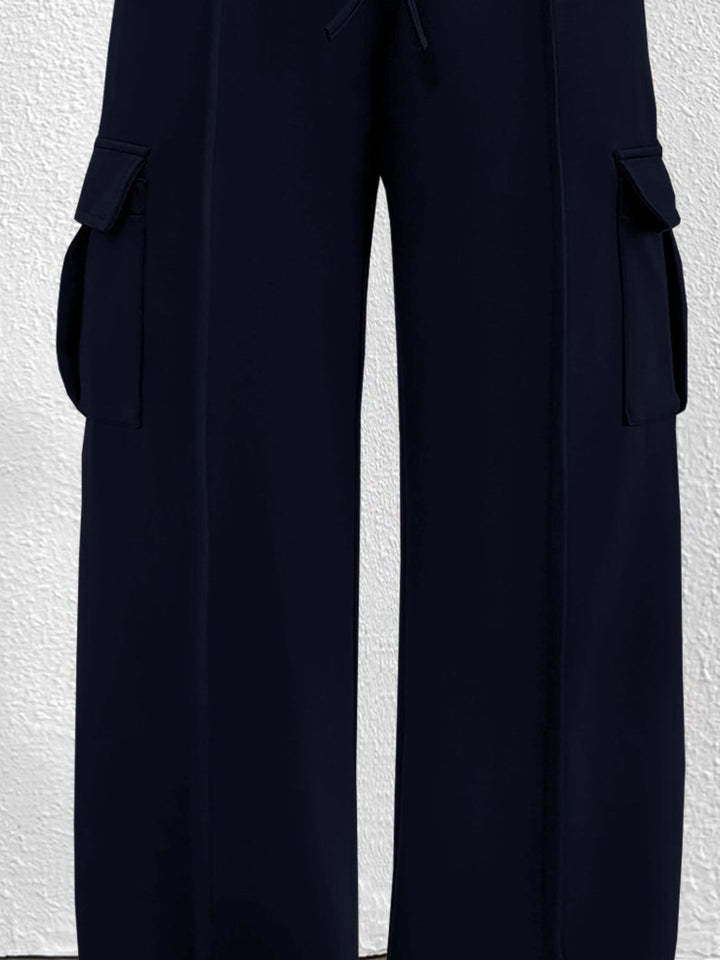 Close-up of the women's navy cargo pockets and drawstring waist