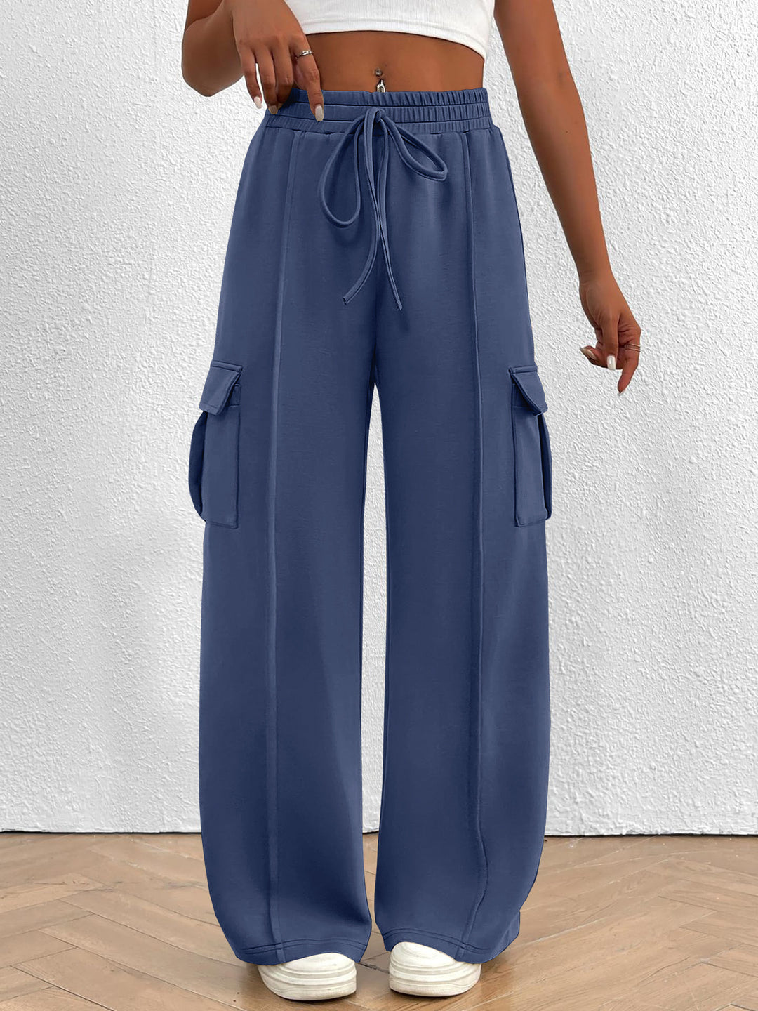 Back view of the women's slate blue high waisted wide leg cargo pants