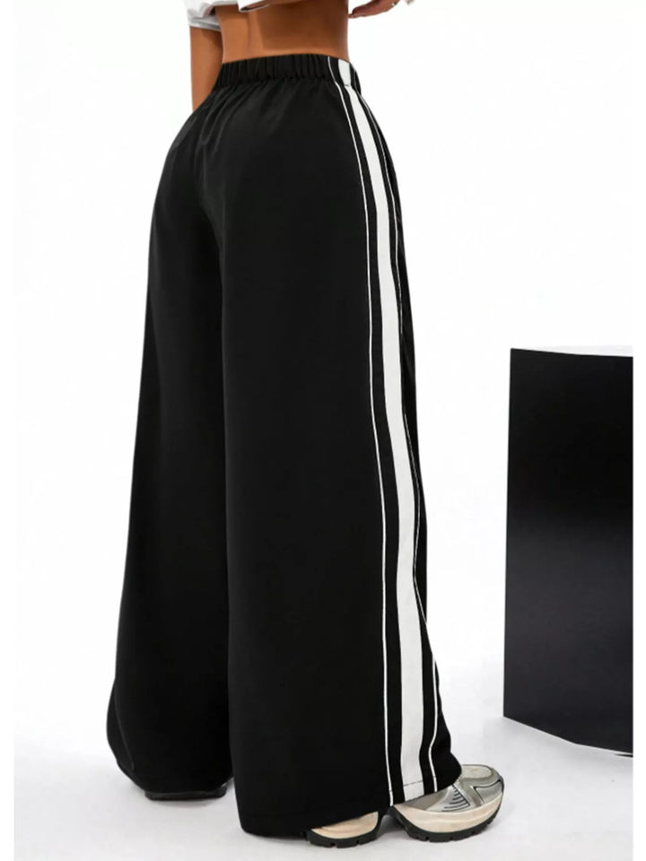 Contrast side stripes elastic waist baggy in black, back view