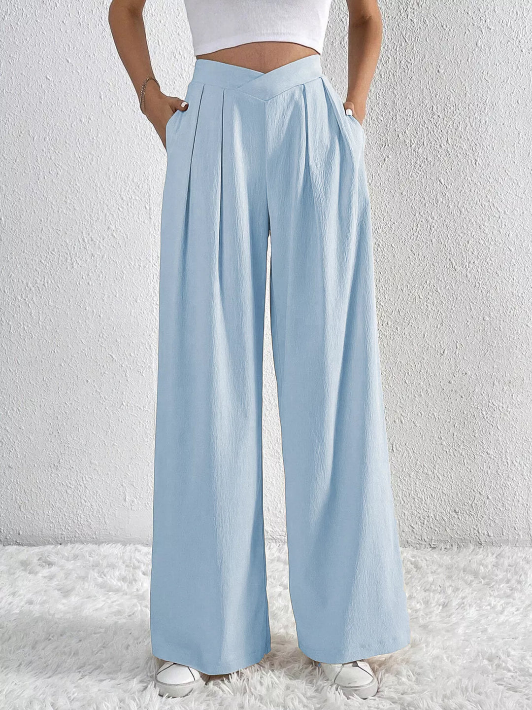 Light blue high waist wide leg pants with pleats and side pockets
