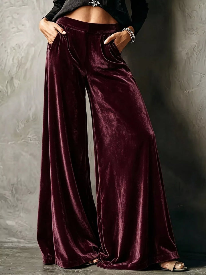Burgundy wide leg pants, high waisted with a shiny velvet-look drape