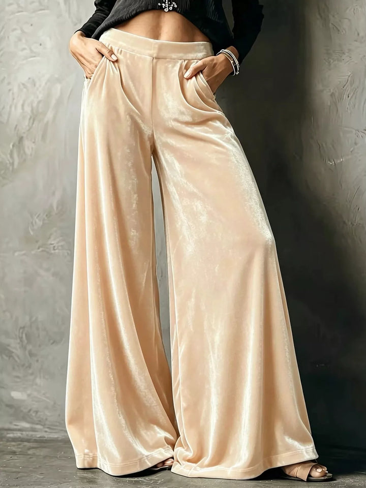 Champagne high waisted wide leg pants with a shiny velvet-look finish