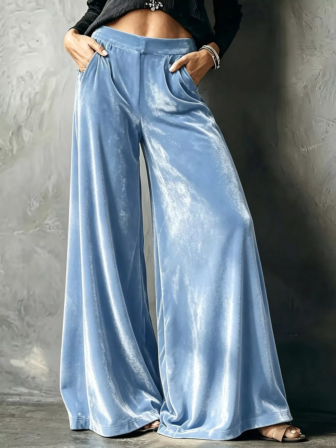 Light blue wide leg pants, high waisted with a shiny velvet-look sheen