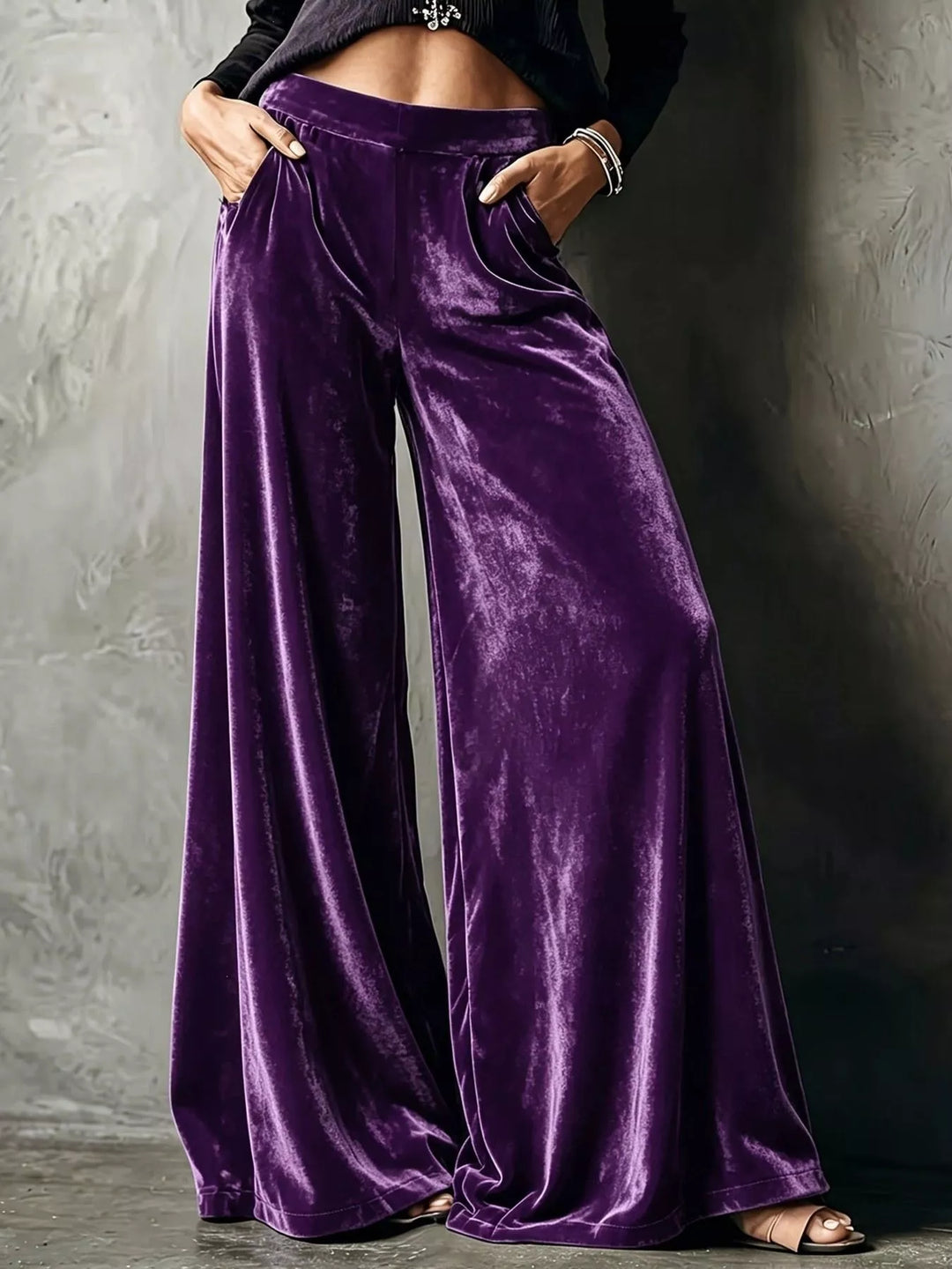 Purple wide leg velvet-look pants with a high waist, front view