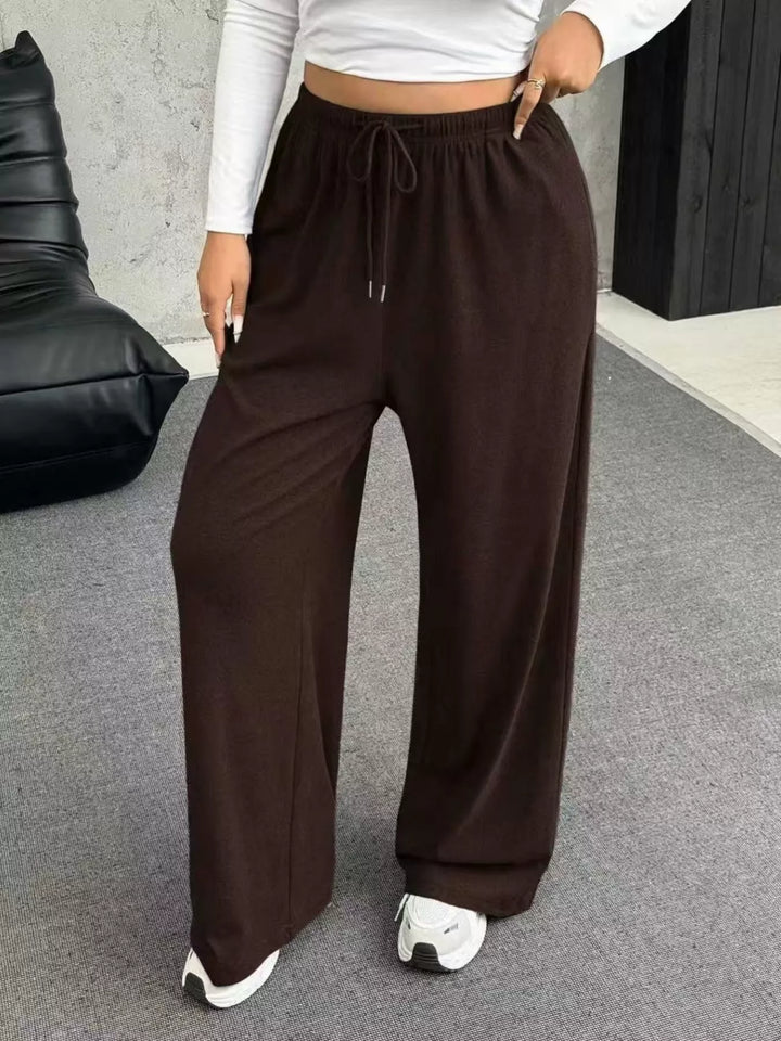 Women's wide leg pants in brown, ribbed texture drawstring full length, front view