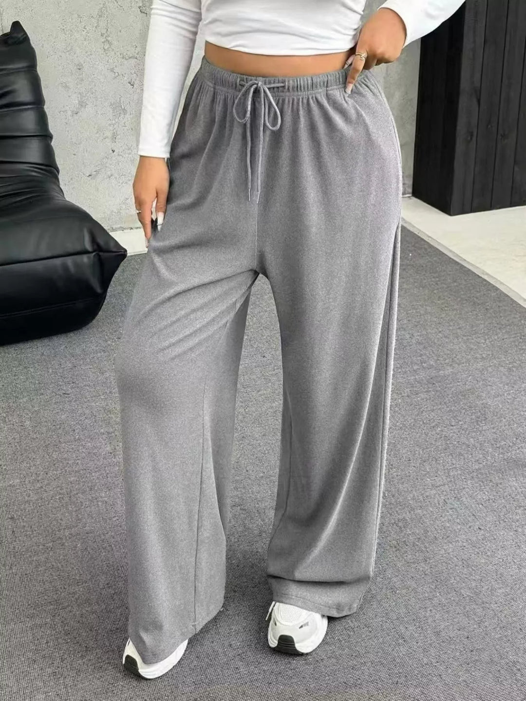 Light gray ribbed wide leg pants with drawstring, front view with white crop top