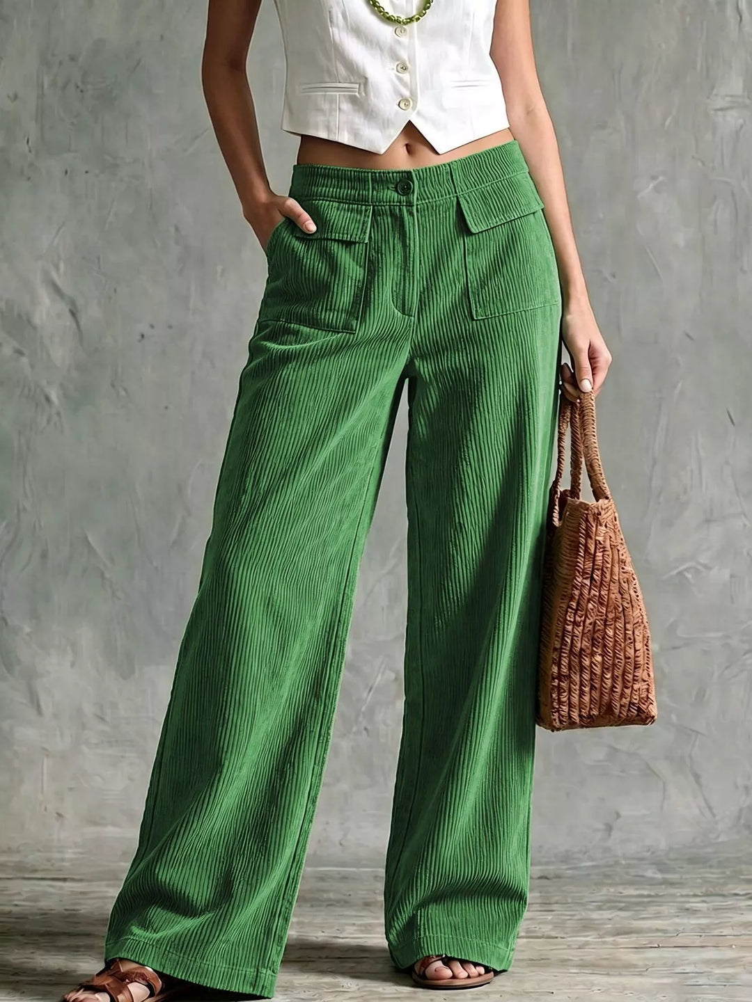Green wide leg pants with flap pocket styled with a white top