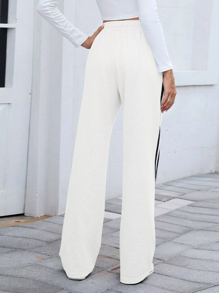 Back view of the white high rise wide leg pants