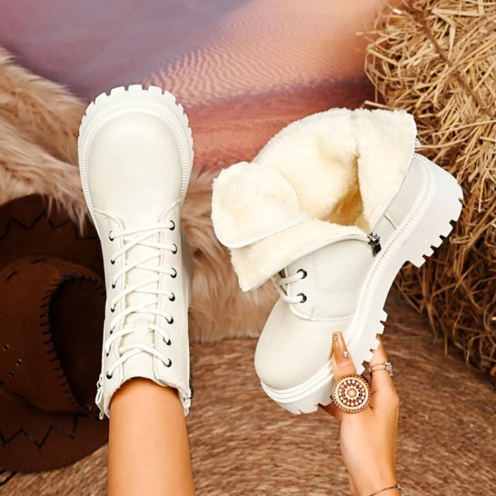 Ivory lace up boots shown from above with the lined cuff folded down
