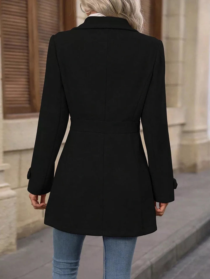 Back view of the black winter coat with fitted waist and notched collar