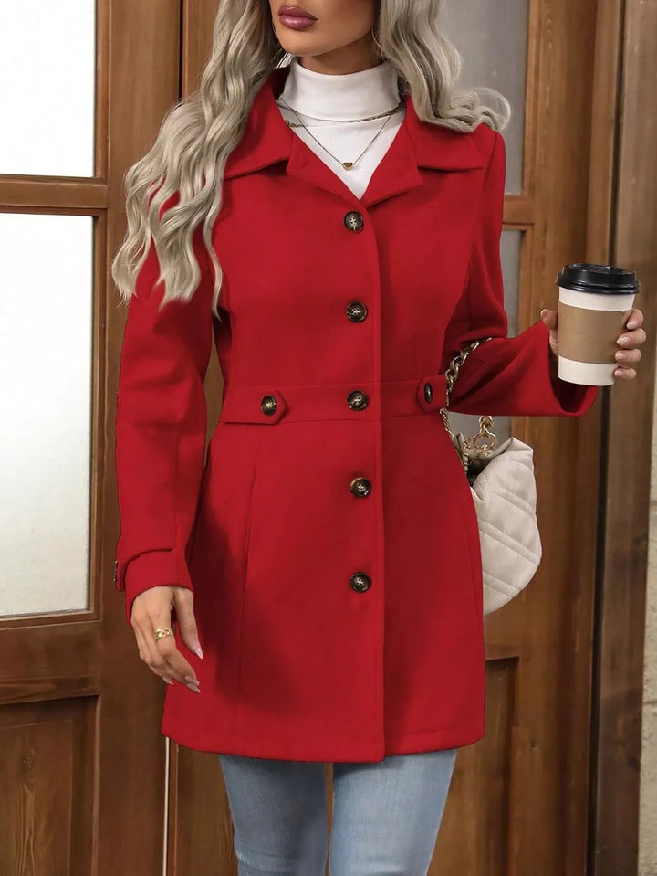 Red fitted button up coat, front view, holding a coffee cup