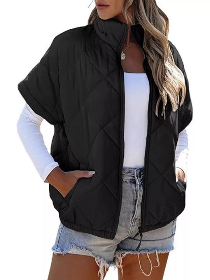 Diamond quilted short sleeve zip in black, front view
