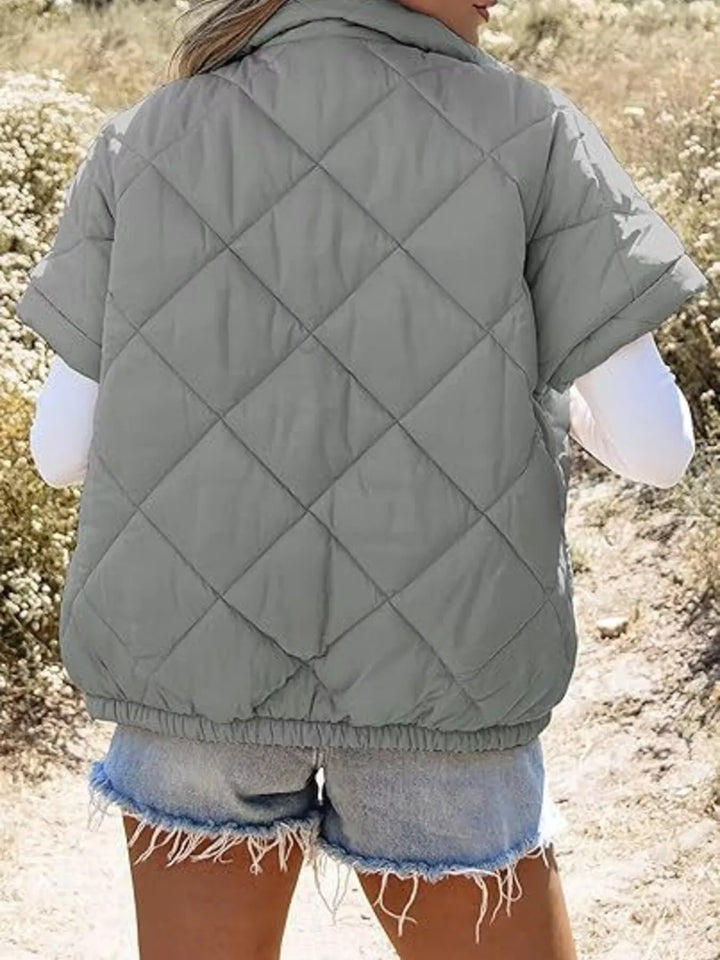Diamond quilted short sleeve zip in grey, back view