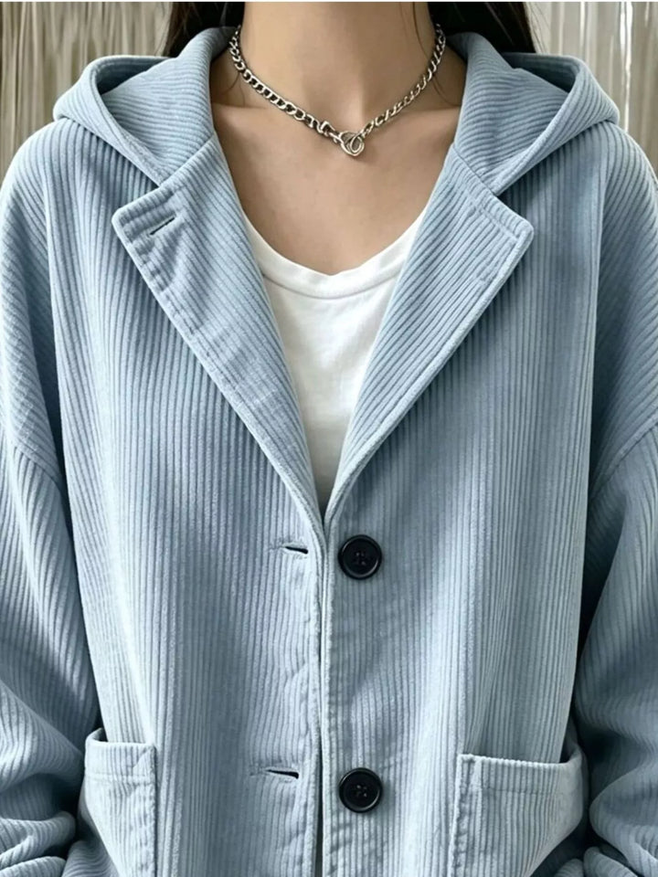 Hooded corduroy-look button front in light blue, styled on model