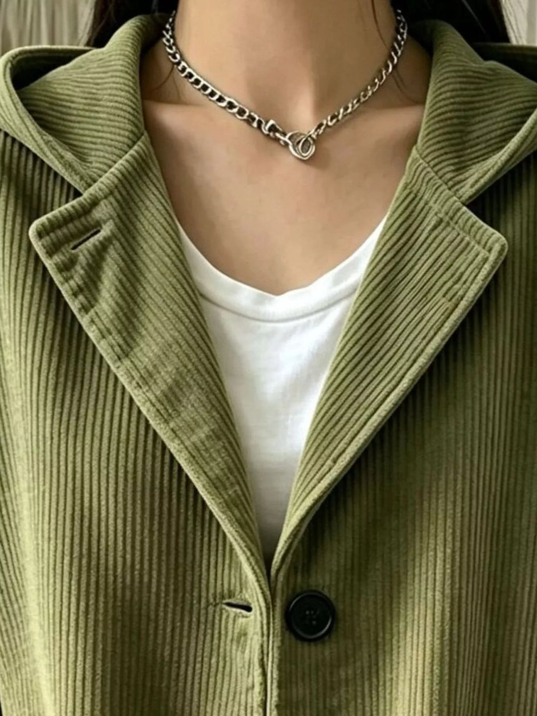 Hooded corduroy-look button front in moss, close-up detail