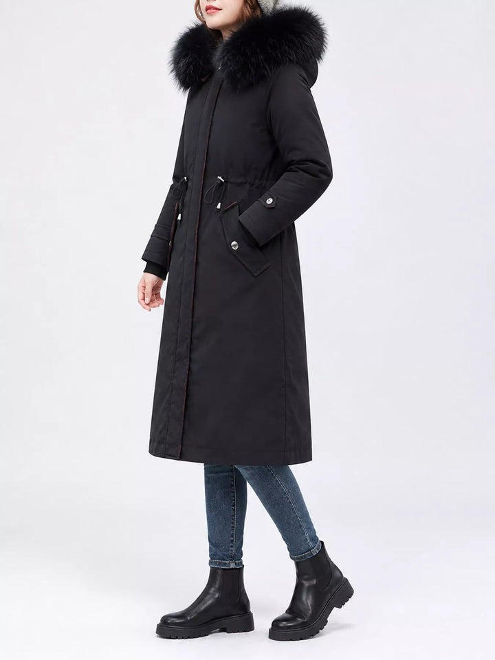 Faux fur hood drawstring waist longline in black, styled on model