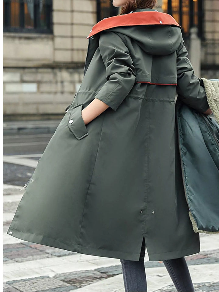 Faux fur hood drawstring waist longline in dark green, styled on model