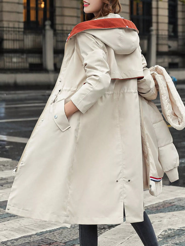 Faux fur hood drawstring waist longline in off-white, styled on model